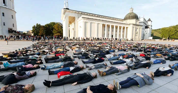 After Losing 8 Friends To Suicide, I Invited People To Lie Down In Lithuania To Show The Suicide Rate