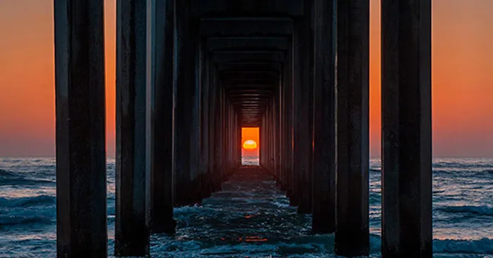 Twice A Year, The Sunset Aligns Perfectly With This Pier In California