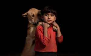 These 10 Orphan Boys Chose To Share The Little Food They Have With 10 Dogs They Adopted