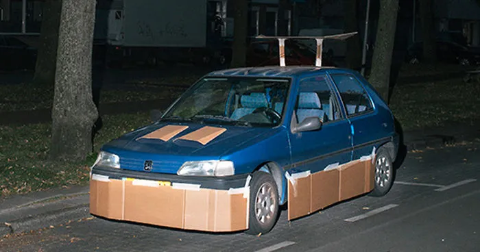 This Guy Walks Around At Night Pimping Random People's Cars With Cardboard