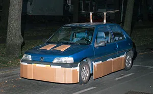 This Guy Walks Around At Night Pimping Random People's Cars With Cardboard
