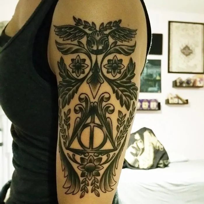 Owl With The Snitch And The Hallow Sign