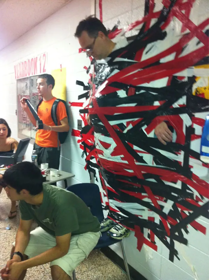 Principal Thinks Of A Genius Fundraiser - 1 Dollar For A Piece Of Tape