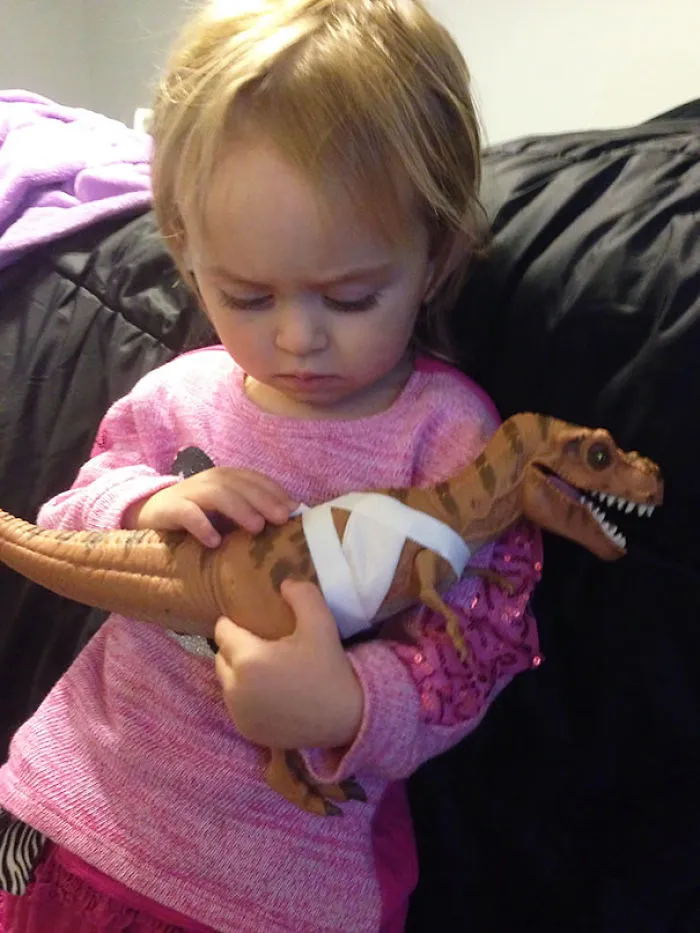 When These Jurassic Park Battle Damage, Open Wounded, Dinosaurs Originally Came Out, People Complained How They Were Too Violent For Children. Yet Here's My 2-year-old, Who Asked Me To Help Treat His Wounds, And Now Comforting Him