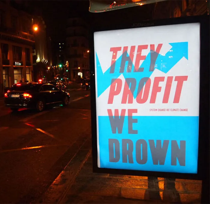 Artists Fill Paris With 600 Fake Ads To Protest Corporate Sponsorship Of Climate Conference