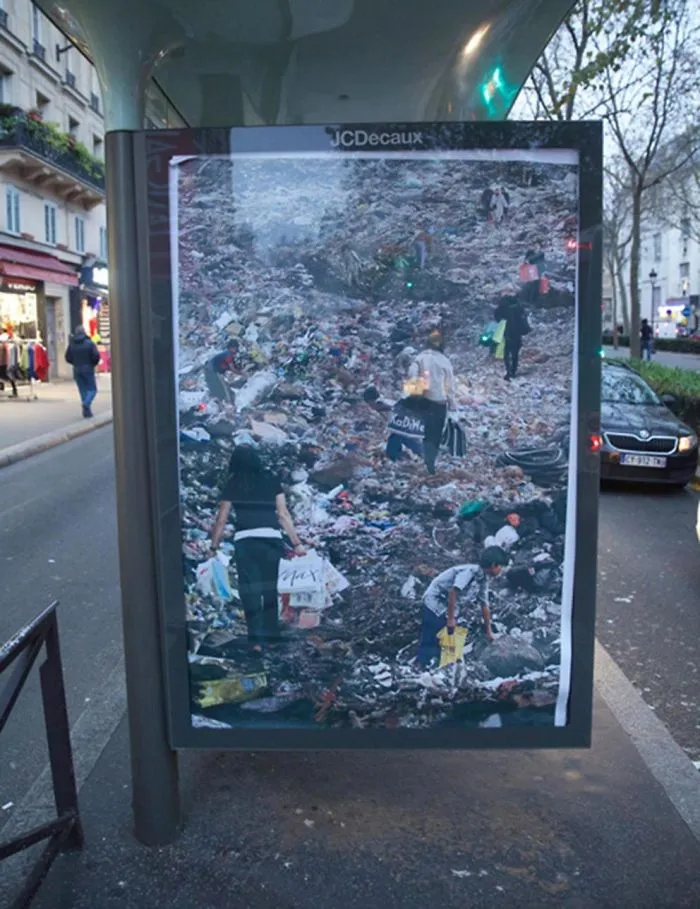 Artists Fill Paris With 600 Fake Ads To Protest Corporate Sponsorship Of Climate Conference