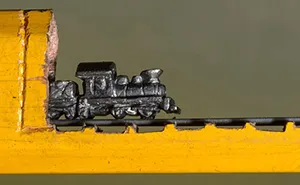 I Found A Carpenter Pencil In The Shop And Carved It Into A Train On Rails