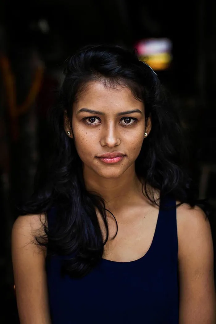 Portrait of a woman by a Romanian photographer showcasing global beauty.