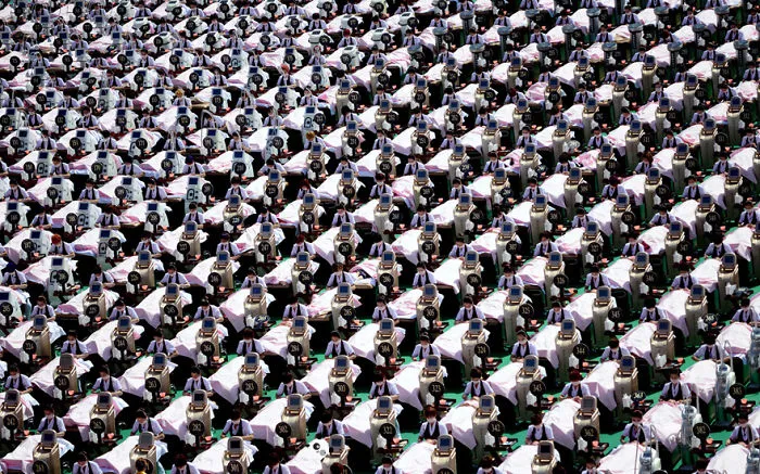 Can You Find The Panda Among A Group Of 1,000 Customers Receiving Facial Massages?