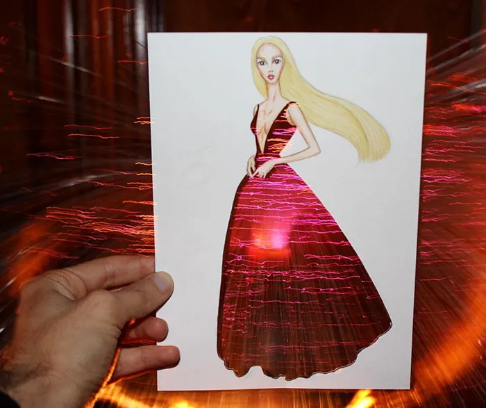 Armenian Illustrator Completes His Cut-Out Dresses With Everyday Objects