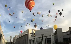 50+ Hot Air Balloons At My School One Morning. I Caught In On My Iphone.