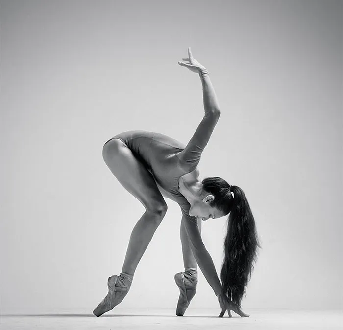 Ballet dancer striking a pose, showcasing grace and flexibility, celebrated on Ballet Day.