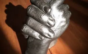 Brothers Hands Cast In Stone With Silver Finish