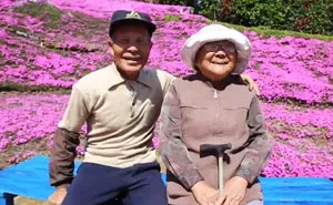Loving Husband Spends 2 Years Planting Thousands Of Flowers For His Blind Wife To Smell