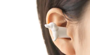 Dog-Shaped Earplugs That Look Like A Really Long Wiener Pup