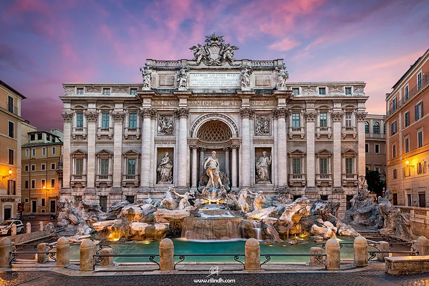 Admiring The Trevi Fountain In Rome, Italy
