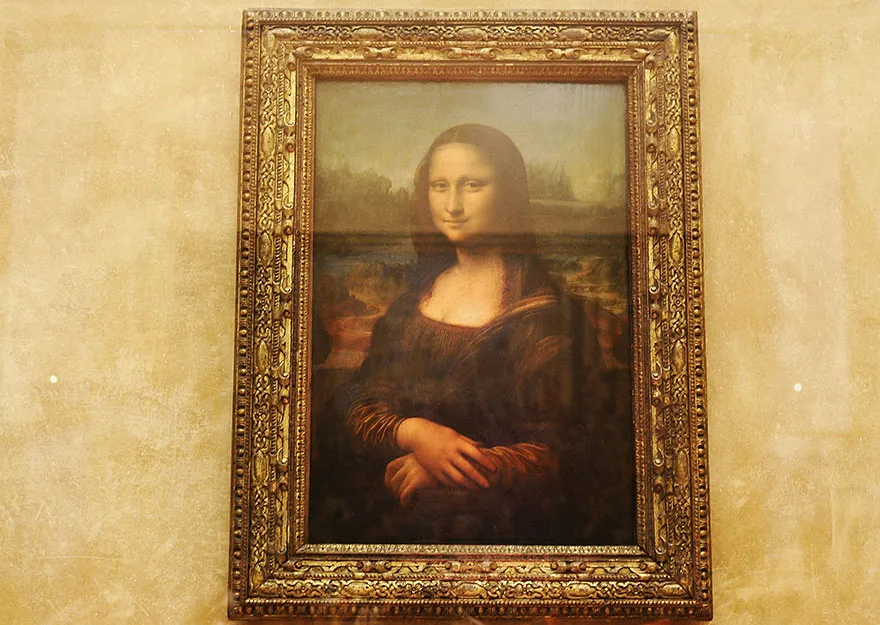 Admiring Mona Lisa In Louvre Museum, Paris, France