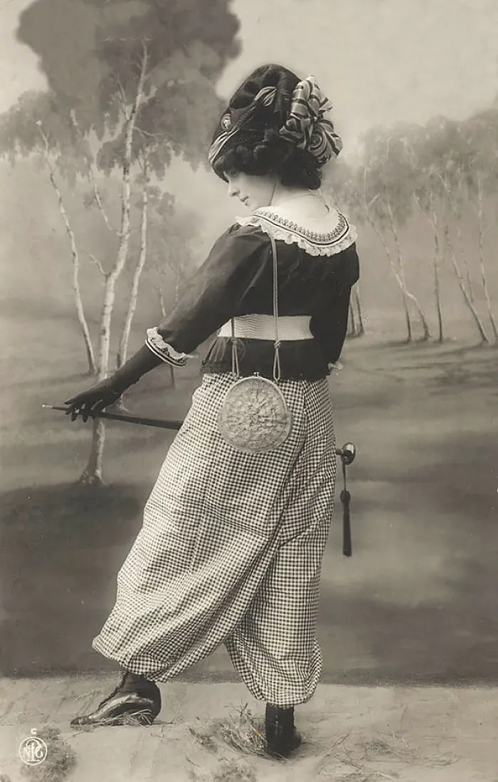 Unknown Lady With Big Hat And Umbrella
