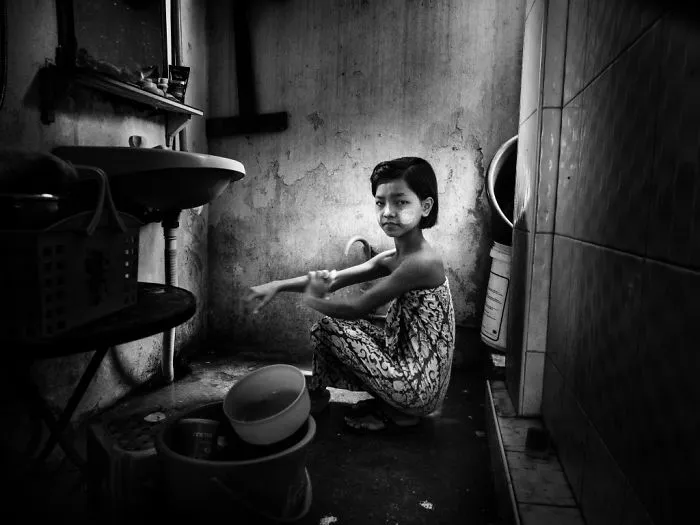 Myanmar – A Little Girl In The Bathroom By Linda De’nobili, Italy (1st Place In The Documentary & Street Category, Second Half)