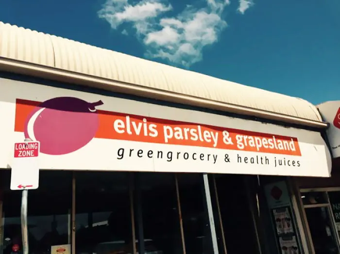 Greengrocery & health juices shop sign ‘elvis parsley & grapesland’