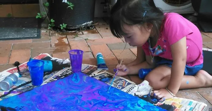 My 3-Year-Old  Daughter Creates Paintings Of Galaxies Using Paint, Glitter And A Fork