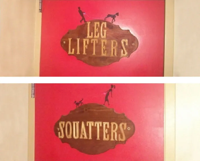 Funny bathroom signs labeled "Leg Lifters" and "Squatters" on red doors.