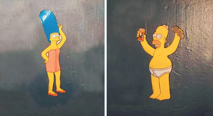 Funny bathroom signs featuring cartoon characters in humorous poses.