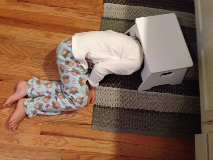 My Daughter "hiding" In The Kitchen. She Was Surprised When I Found Her.