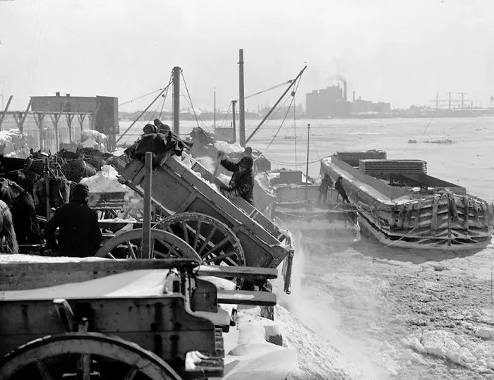 Snow And Ice Taken From The City Is Dumped Into The East River, New York