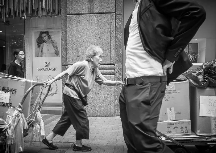 I Shoot People In The Street And Like To Watch Their Expressions Through My Camera