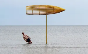 Artist Takes Art Exhibition To Another Level By Placing His Wooden Sculptures Right In The Sea