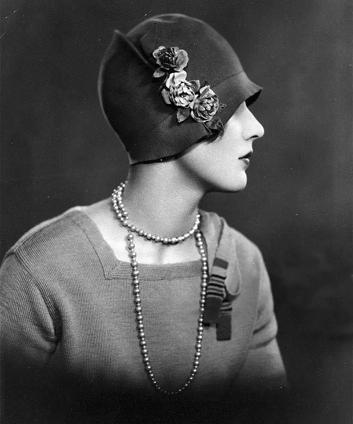 A Woman Wearing A Cloche Hat Decorated With Flowers, 1927