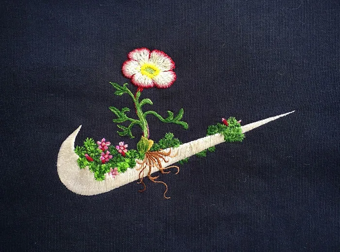 Artist James Merry Decorates Sport Logos With Embroidered Flowers