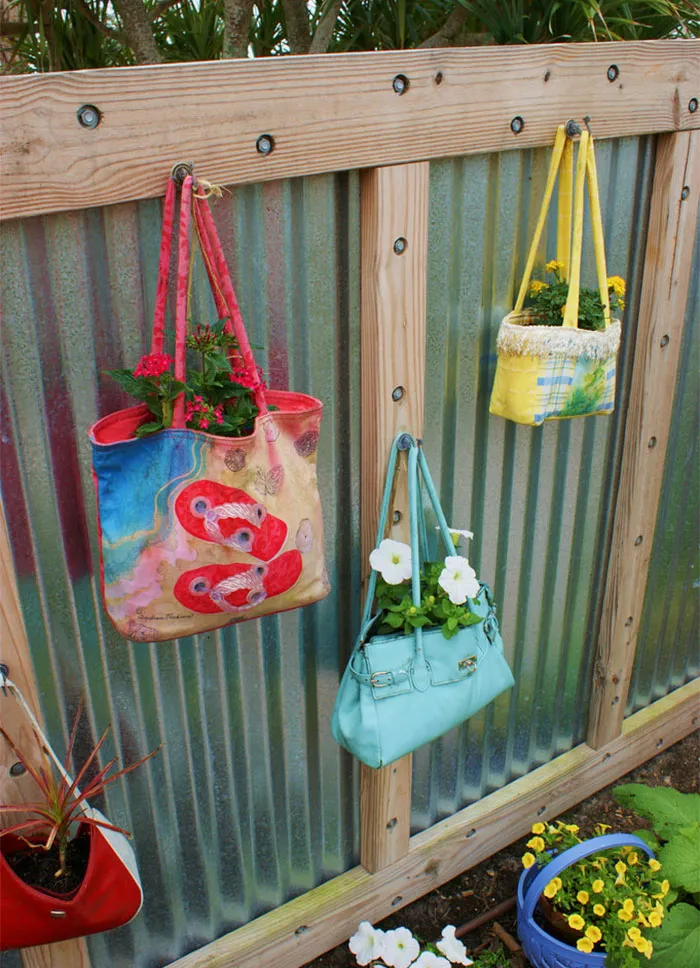 Repurposed Handbag Fence Decor