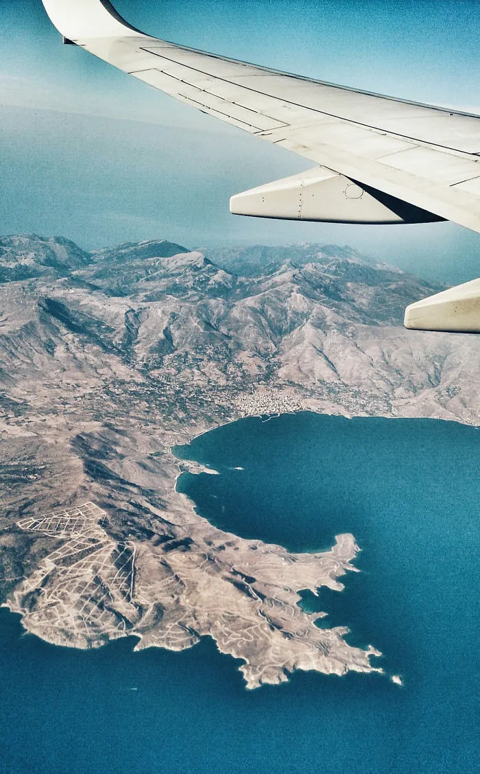I Catched The Pictures Through An Airplane Window Using My Phone Camera