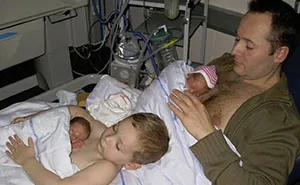 Father And Son Practicing Skin-To-Skin Contact With Twin Babies Go Viral