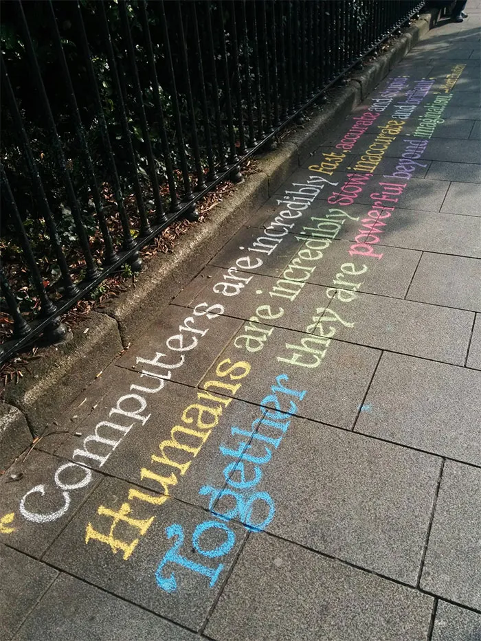 Sidewalk With Handwritten Sign