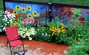 I Revived Our Old Garden Fence By Painting Vivid Flowers On It
