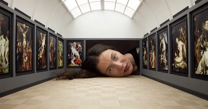 People Put Their Heads Inside Miniature Galleries To Become Famous Art Exhibits Themselves