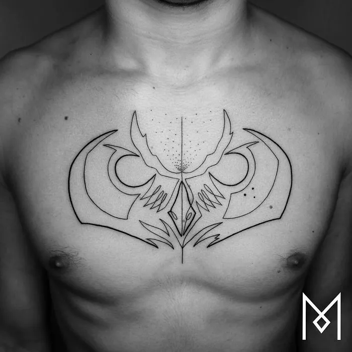 Chest with minimalist single line tattoo by Iranian-German artist, showcasing an abstract symmetrical design.