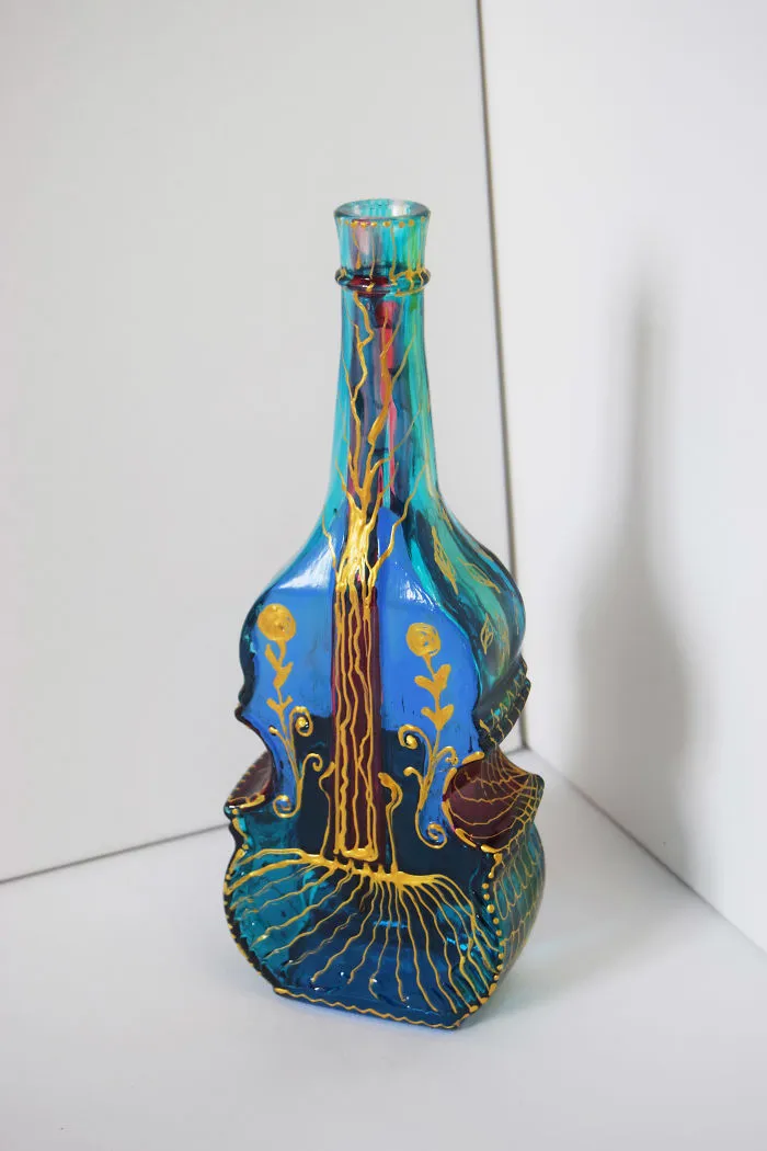 Artist Creates Intricate Patterns On Used Glass Bottles