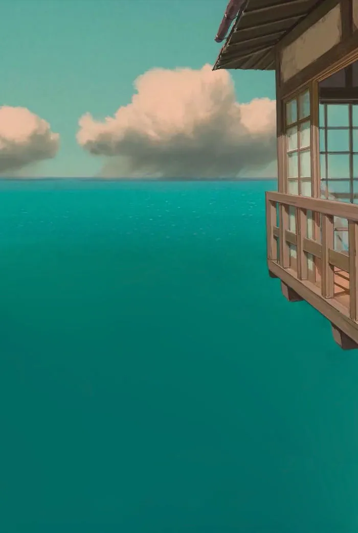 Studio Ghibli ocean view wallpaper with house on stilts and cloudy sky.