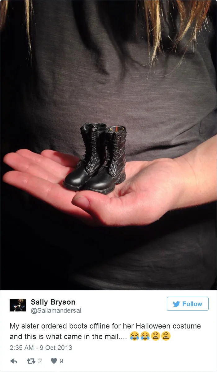 Tiny boots held in a hand, illustrating a regrettable online purchase.