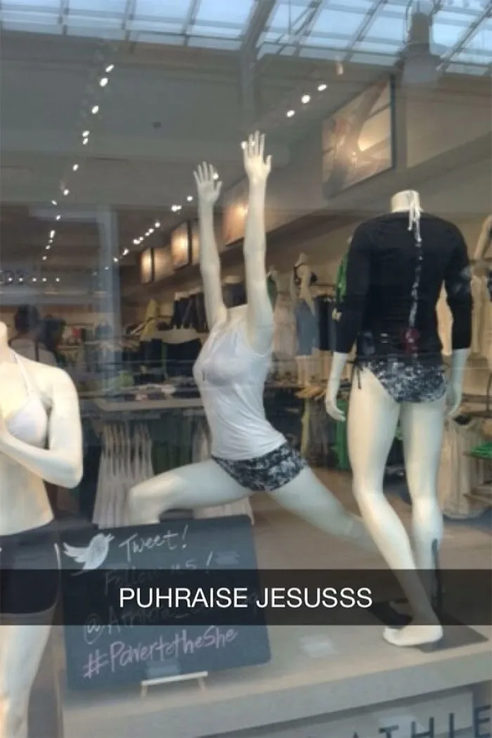 Mannequins in a store window, one posed with arms raised humorously under text "PUHRAISE JESUSSS"; a hilarious Snapchat.
