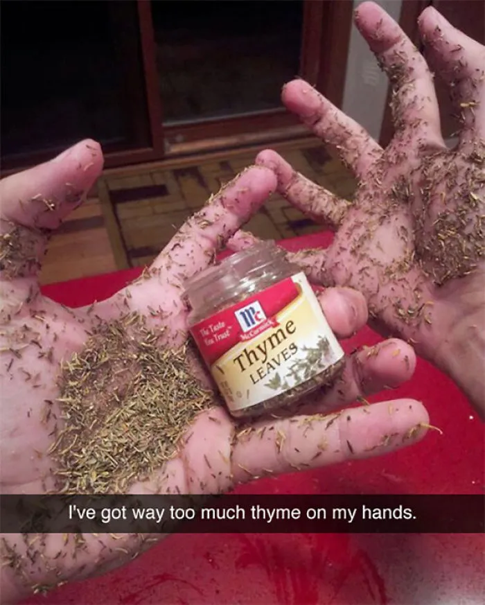 Hands covered in thyme leaves holding a spice jar in a funny Snapchat.