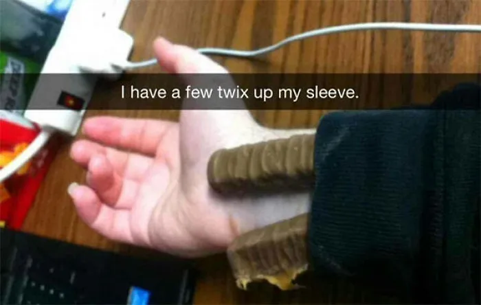 Funny Snapchat showing Twix bars under a sleeve with text overlay: "I have a few twix up my sleeve."