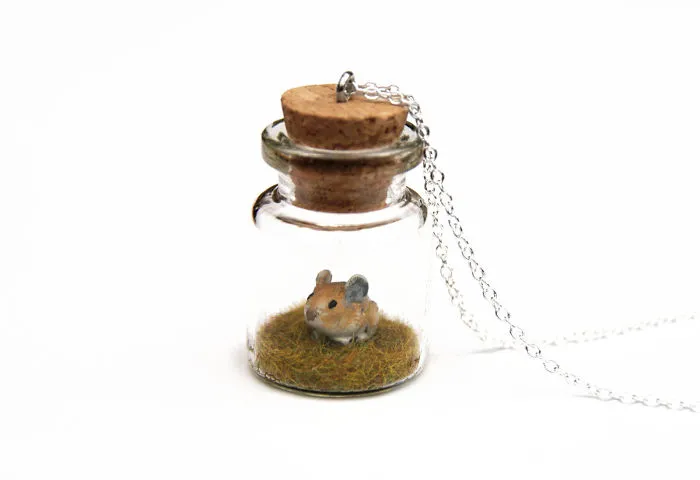 This Artist Creates Miniature Animals In Bottles