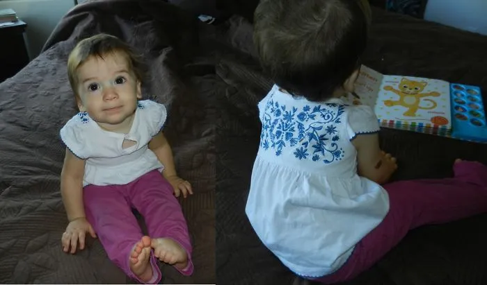 Grandpa Tries His Hand At Dressing The Baby....