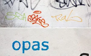 This Guy Is Painting Over Ugly Graffiti To Make It Legible