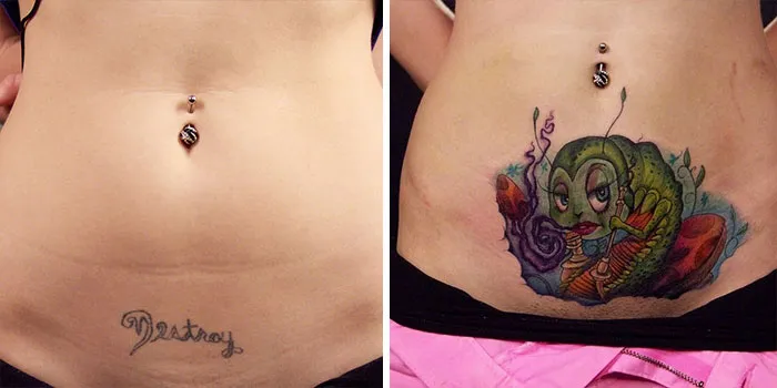Cover-up tattoo transforming "Destroy" with colorful artwork on the lower abdomen.